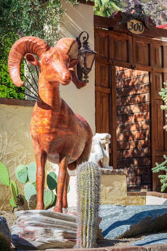 young boy sitting in barbers chair