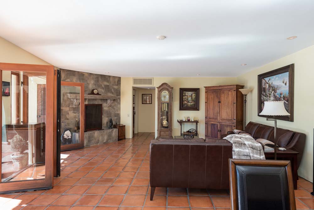 older man having his hair blow dried