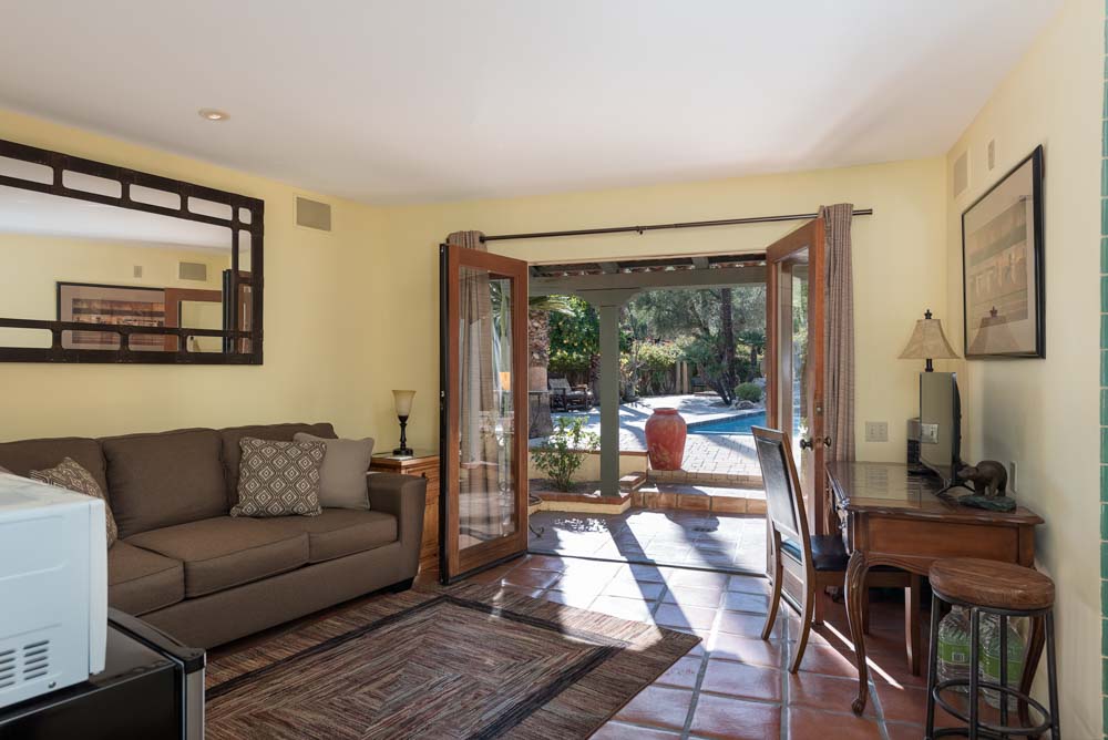 older man having his hair blow dried